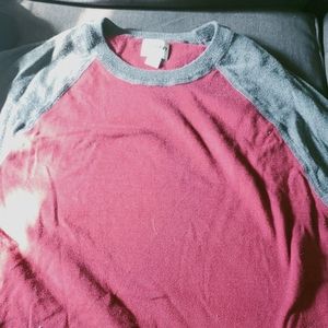 Red sweater with gray stripes.